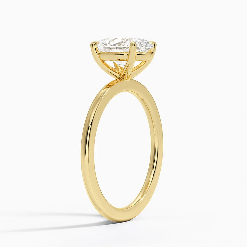Emily oval solitaire yellow gold engagement ring side profile
