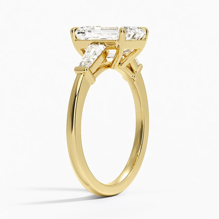 Aiden – Emerald Cut Trilogy Engagement Ring with Tapered Baguettes
