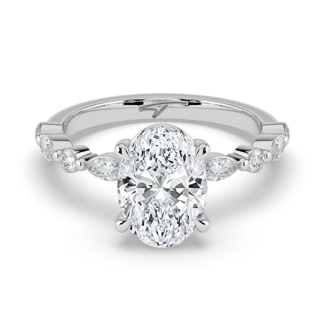 Lara oval engagement ring with marquise and round diamond band