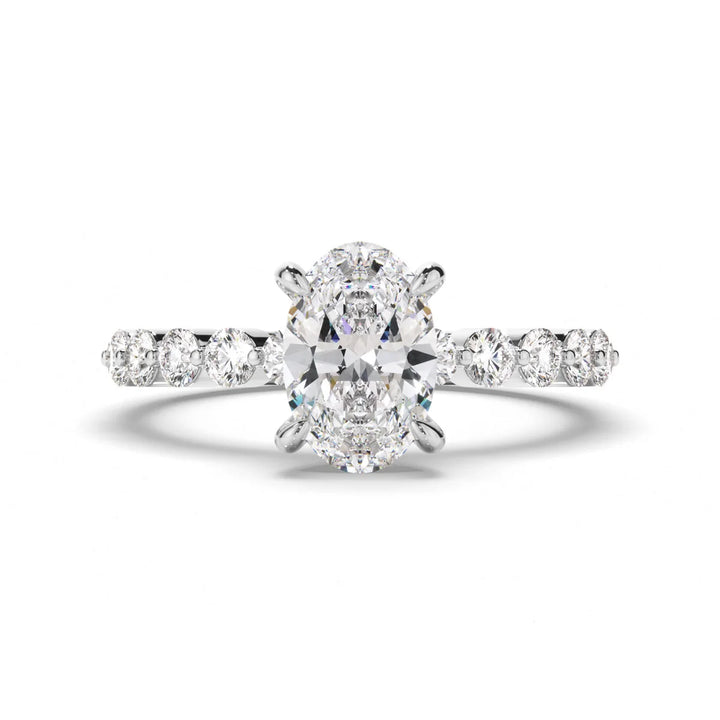 Luna oval engagement ring with round diamond accent band